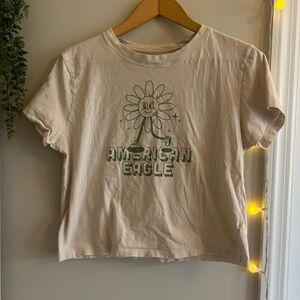 Cropped American Eagle Outfitters Cream Graphic Tee - Green Flower Print size M